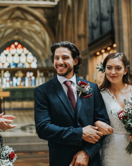 Newly wed couple walking down the aisle