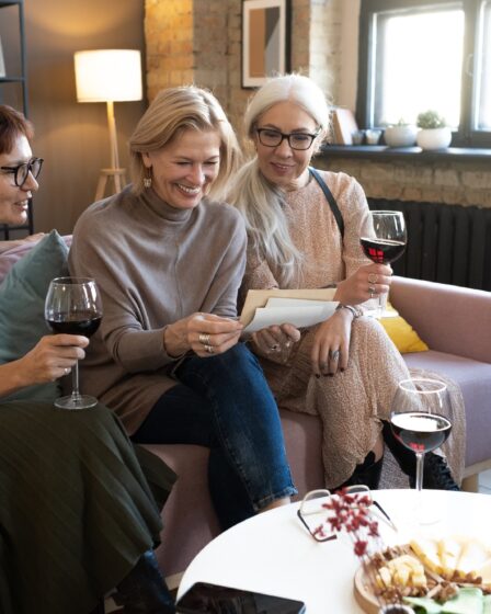 Women reading a letter from their friend